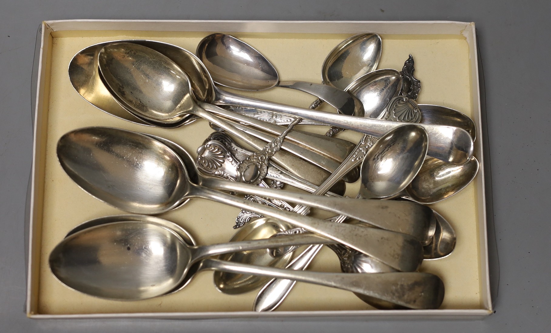 A George III provincial silver caddy spoon, Goss & Parsons, Exeter, 1810 and seventeen assorted items of mainly 20th century flatware